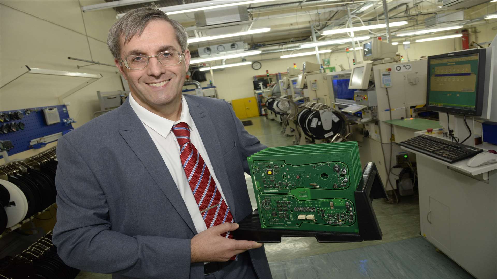 Managing director Graham Hertage with a circuit board at the Megger factory in Dover