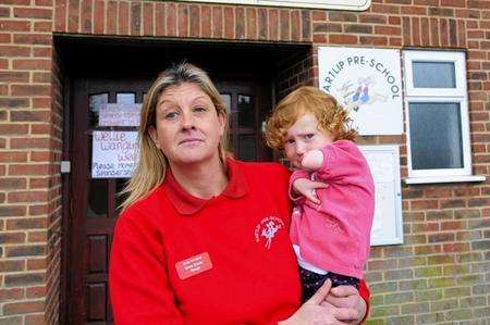 Pre-School manager Donna Brazier with Victoria, 2, who is disabled.
