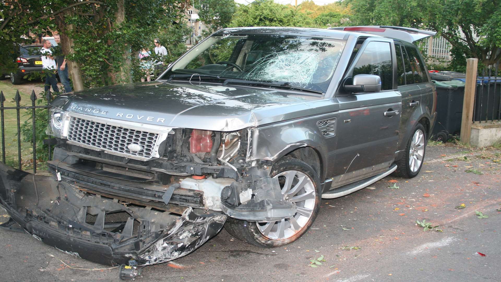 The damaged Range Rover after it crashed through crossing gates at Chartham. Photo: Neil Webber