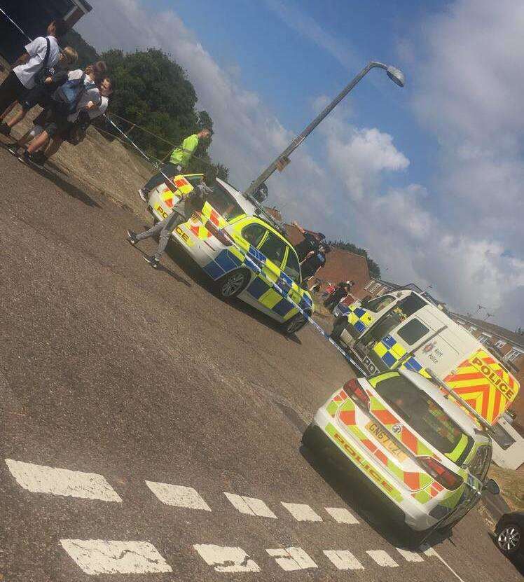 The police have closed the road and the air ambulance has landed at a nearby school. Picture: Logan Enfield