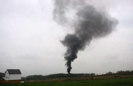 Burning tyres caused a cloud of black smoke to rise from Hoath Wood