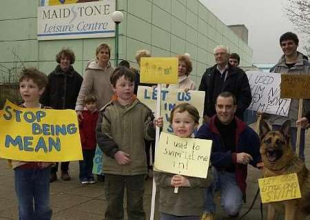 Demonstrators gather outside Maidstone Leisure Centre to protest about new swimming restrictions. Picture: JOHN WARDLEY