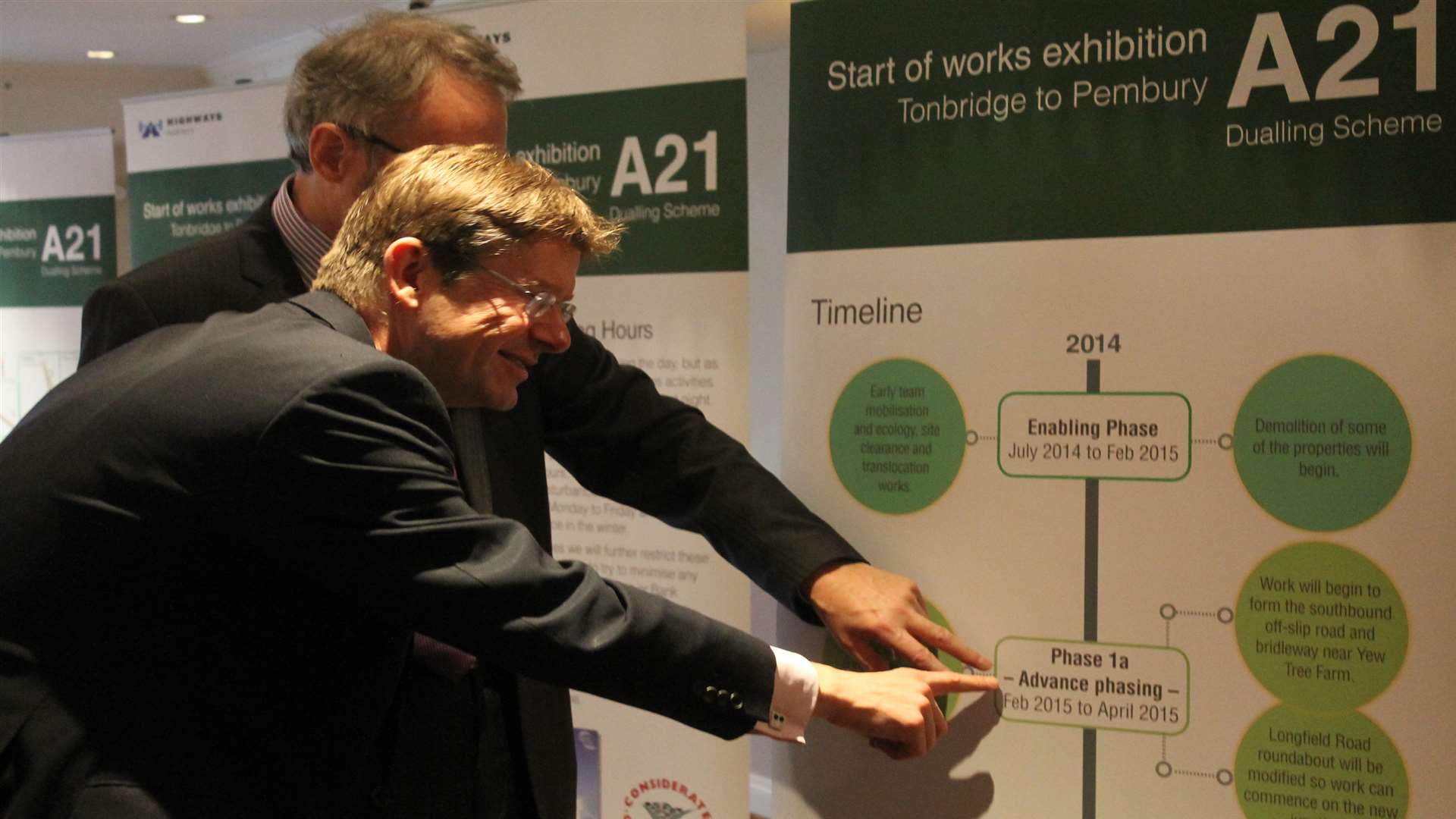 Greg Clark discusses the project timeline at the exhibition