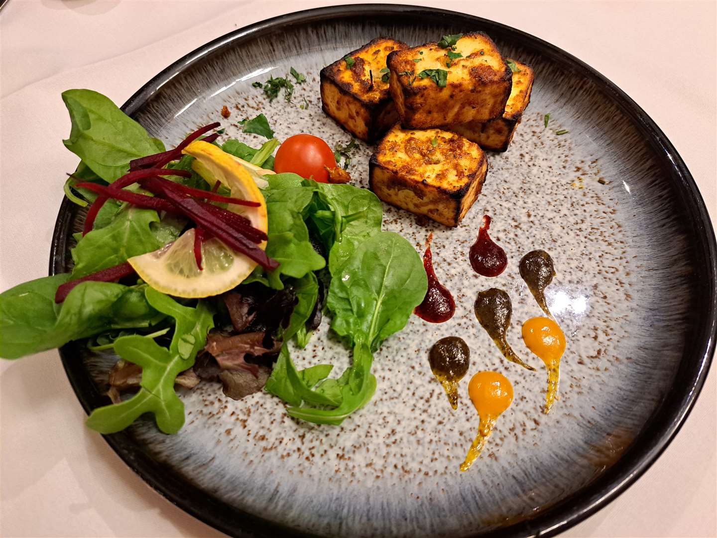 Achari Paneer Tikka, Indian homemade cheese marinated in tamarind, herbs and spices got things off to a tasty start