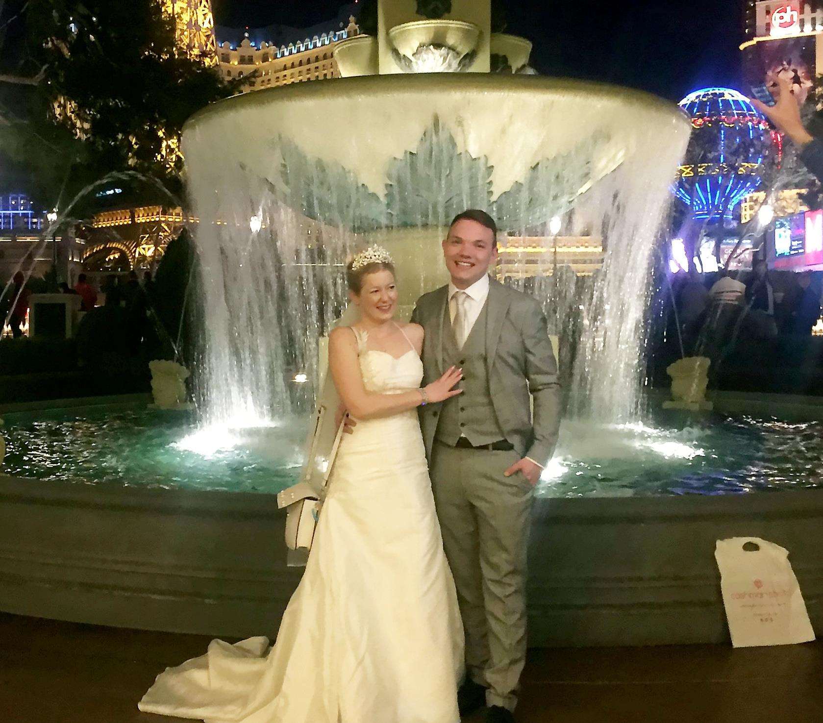 Sarah Elliott, 34, and Paul Edwards, 36, at their marriage in Las Vegas, USA. Picture: SWNS