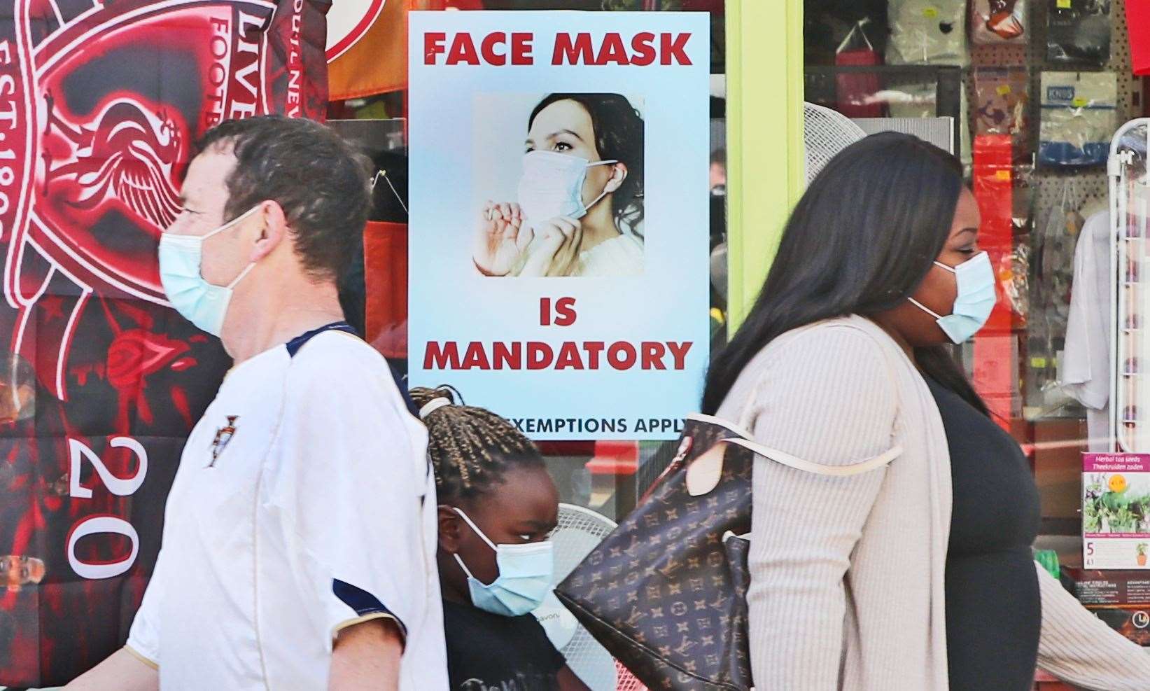 People wearing facemasks in Athy, Co Kildare (Niall Carson/PA)