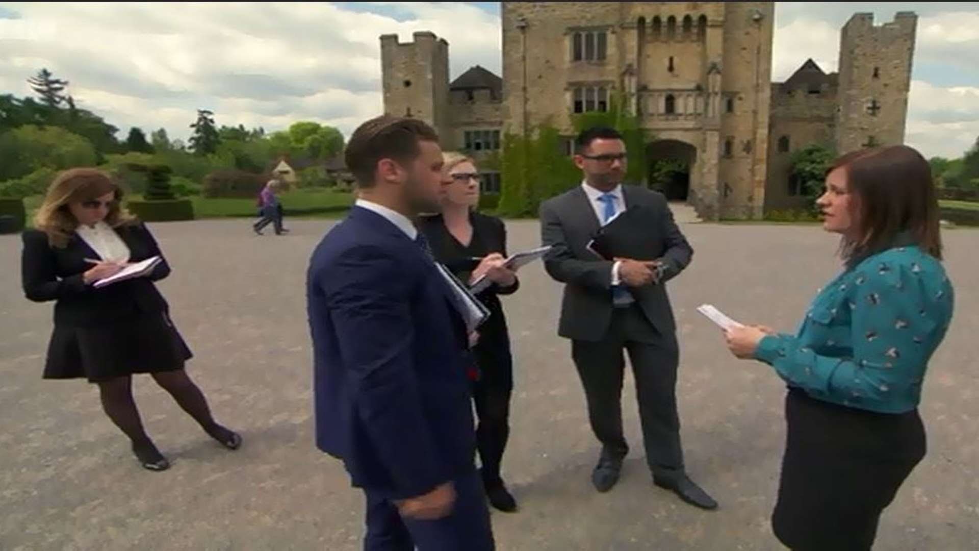 Hever Castle spokesman Sarah Cole negotiates with The Apprentice candidates, watched by Karren Brady. Picture: Hever Castle