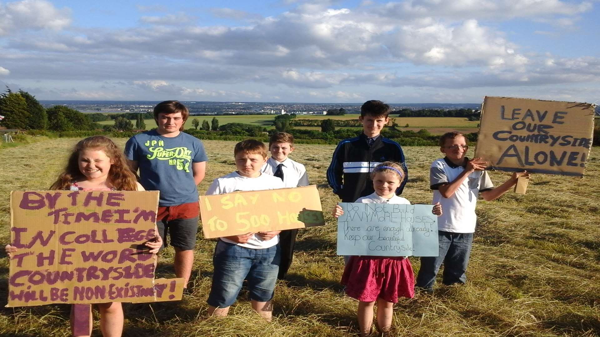 Daisy Gillespie (left) and friends are fighting plans to develop countryside near Hoo