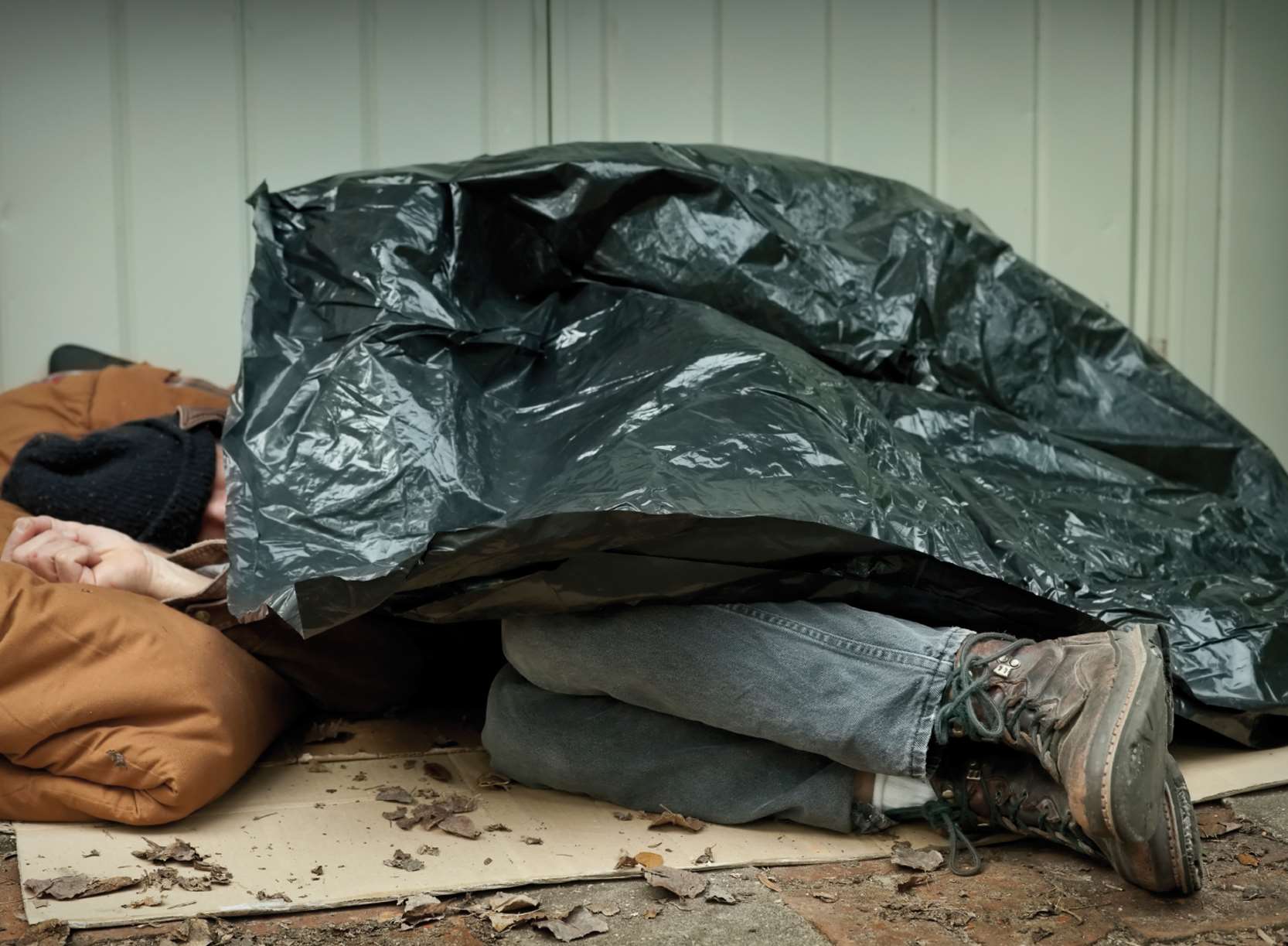 Homeless person living on street. Stock pic.