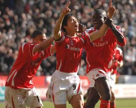 SHEER JOY: Zheng Zhi celebrates his first goal for Charlton. Picture: BARRY GOODWIN