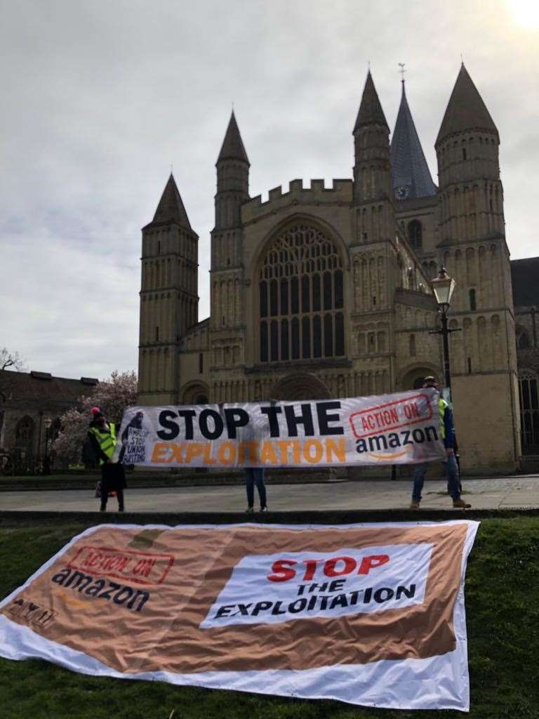 Campaigners stood outside Rochester Cathedral to spread the word that Amazon employees can blow the whistle on any poor treatment