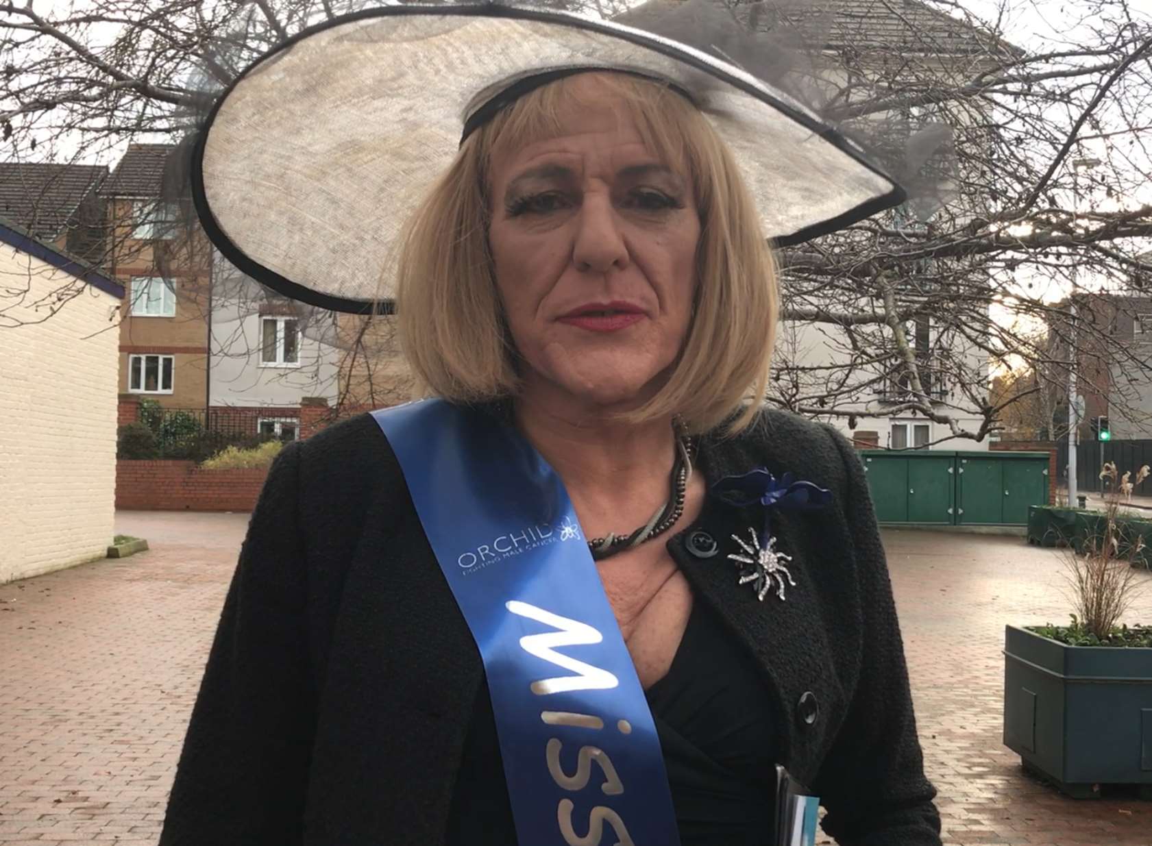 Bernard Bibby as Miss Orchid, at the corner where the abuse happened