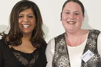 Danielle Amusa collects her Pride in Medway award from ITV's Sangeeta Bharbra