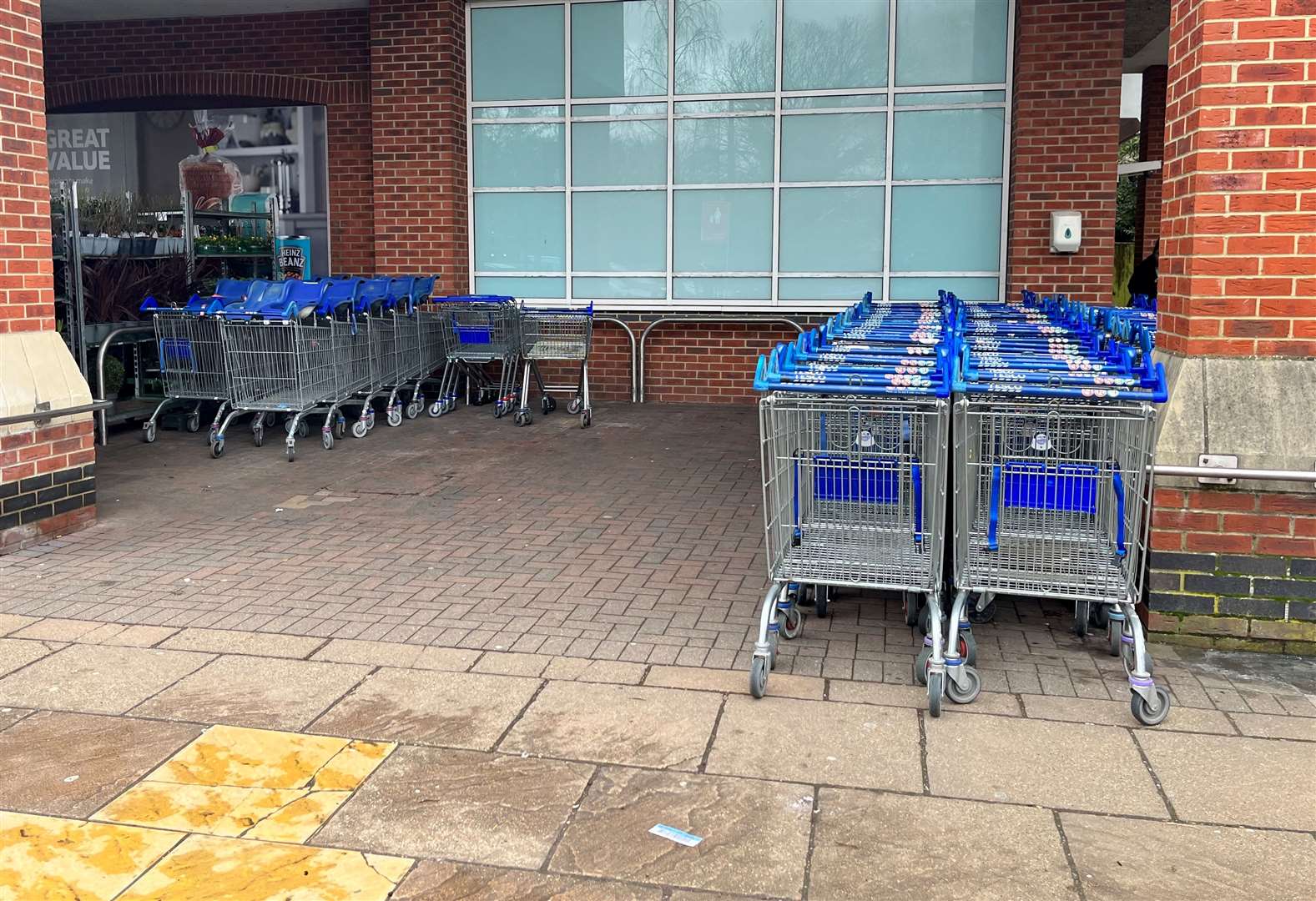Trolleys are still stored by the supermarket entrance, but not all shoppers take them back to the front of the shop