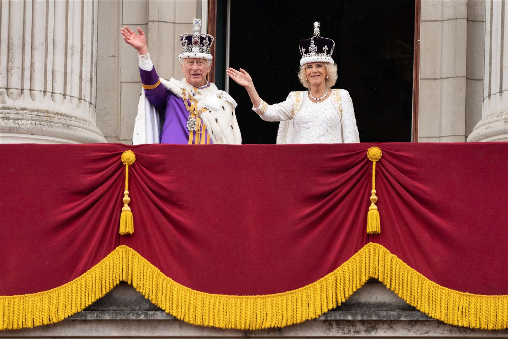 The King and Queen Camilla on the balcony of Buckingham Palace (Stefan Rousseau/PA)