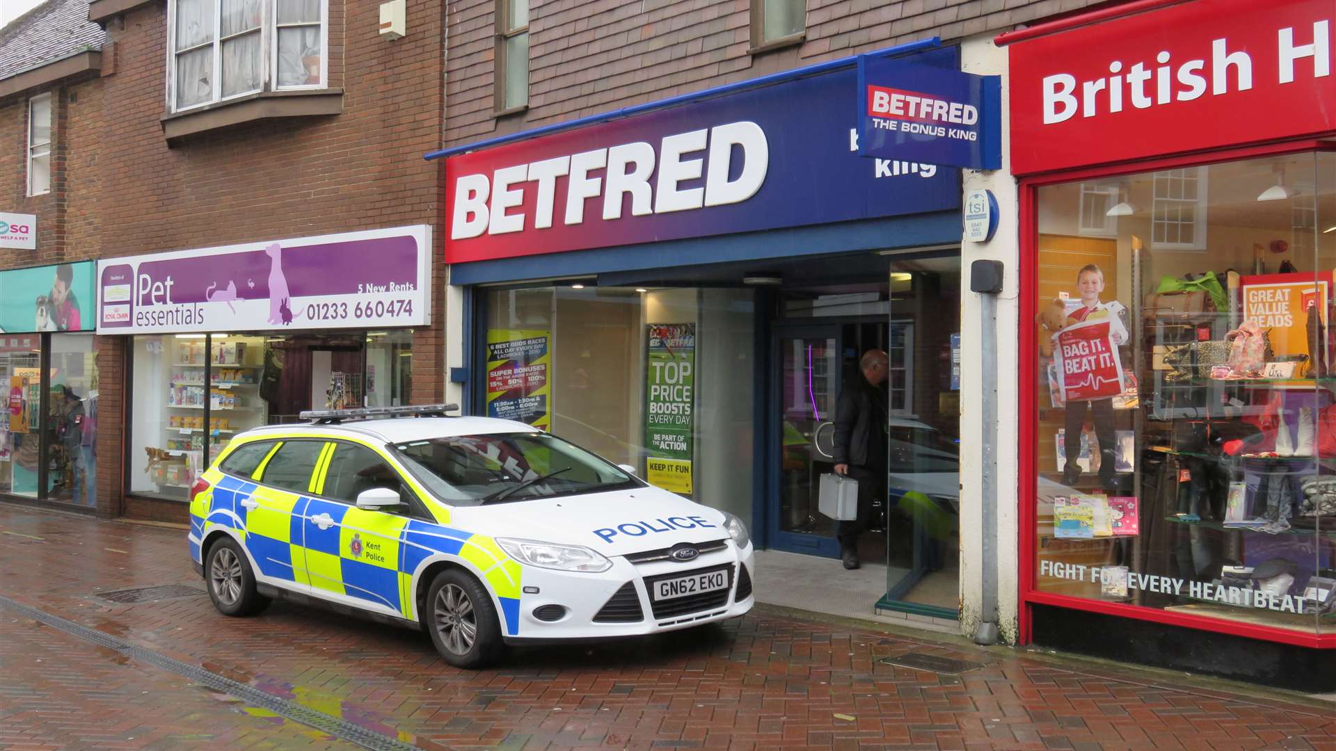 Police are outside the betting shop. Picture: Andy Clark