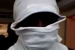 A masked man is featured in the video