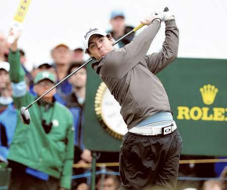 Rory McIlroy drives off from the fourth