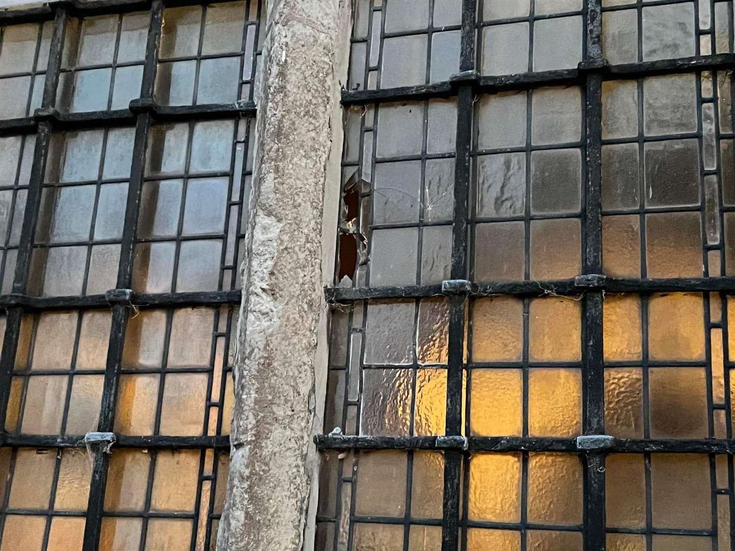 The damaged windows at the Cliffe church