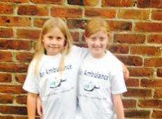 Mollie Whitehead and Ruby Websper have practiced especially hard for the three-legged portion of their charity race