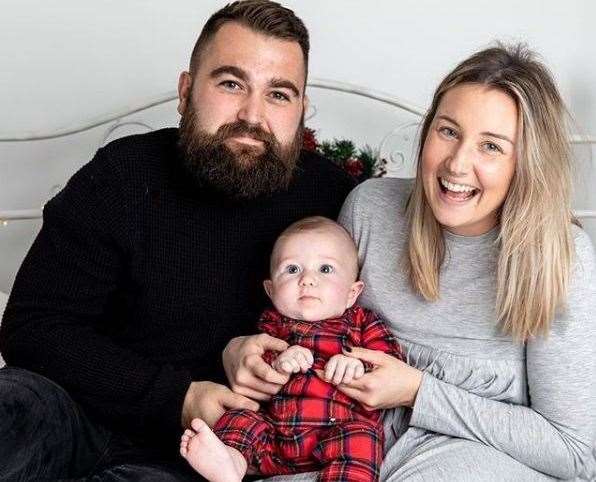 Lyndsay with her partner Karl and their baby son Henry