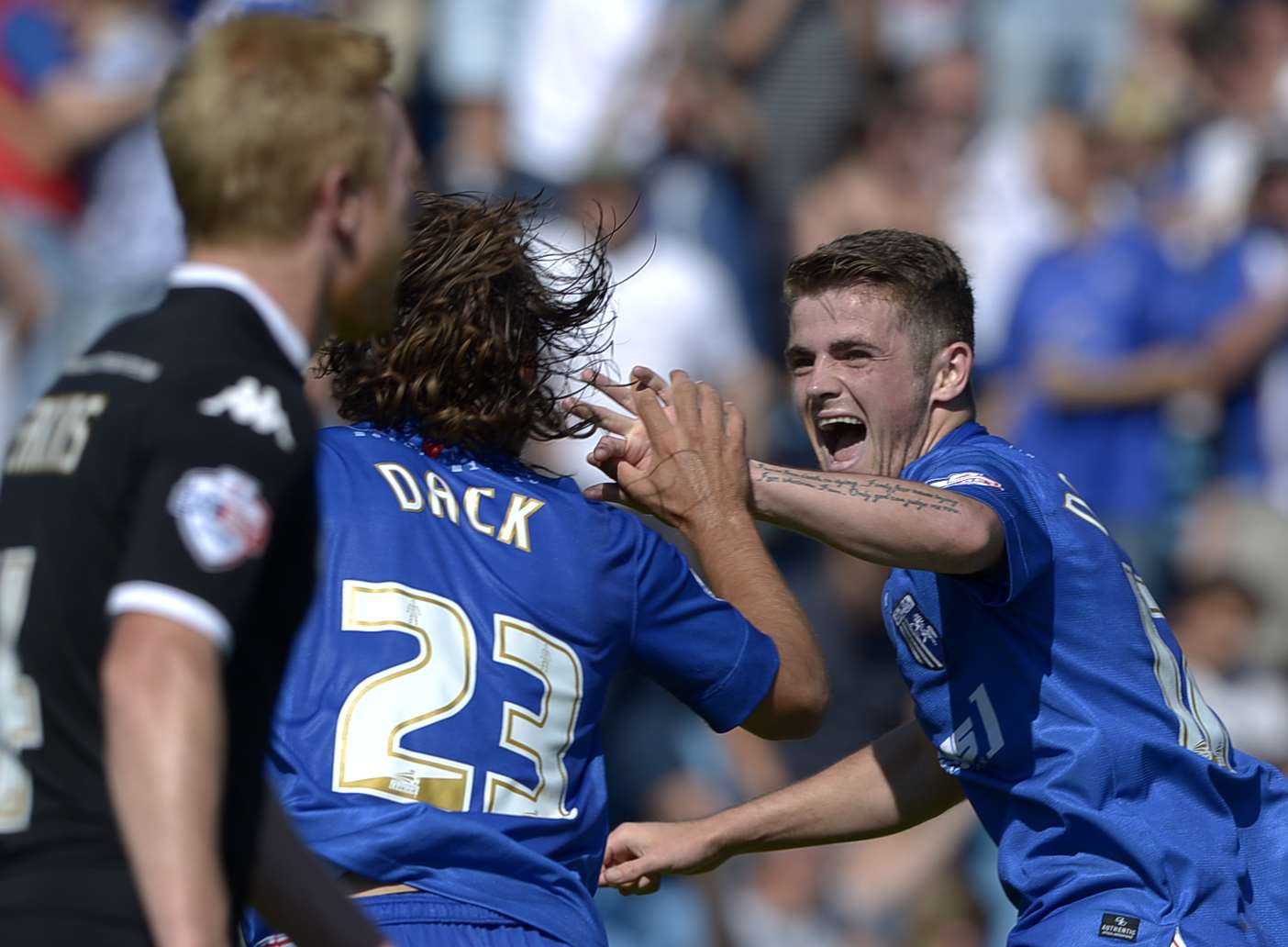 Bradley Dack and Rory Donnelly celebrate the opening goal against Wigan Picture: Barry Goodwin