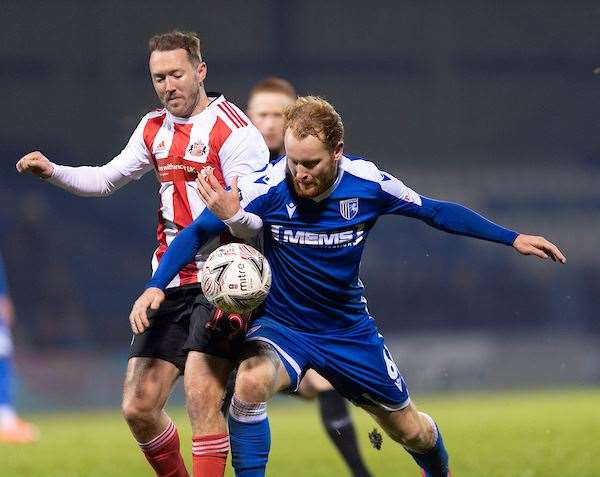 Connor Ogilvie is challenged by Aiden McGeady and felt he should have had a penalty Picture: Ady Kerry (22060161)