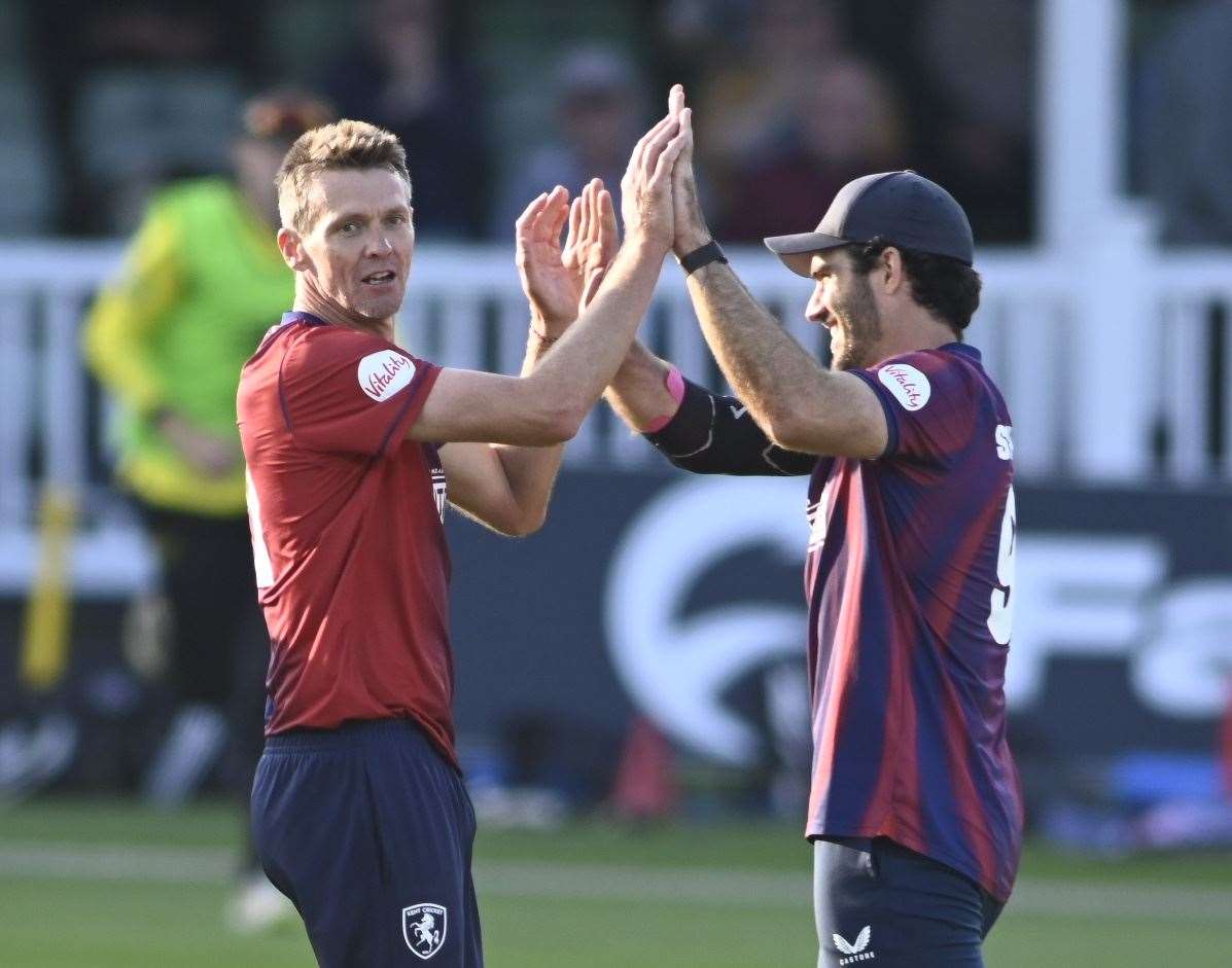 Michael Hogan celebrates with fellow Australian Grant Stewart in Kent Spitfires’ campaign-opening T20 Blast win over Gloucestershire. Picture: Barry Goodwin