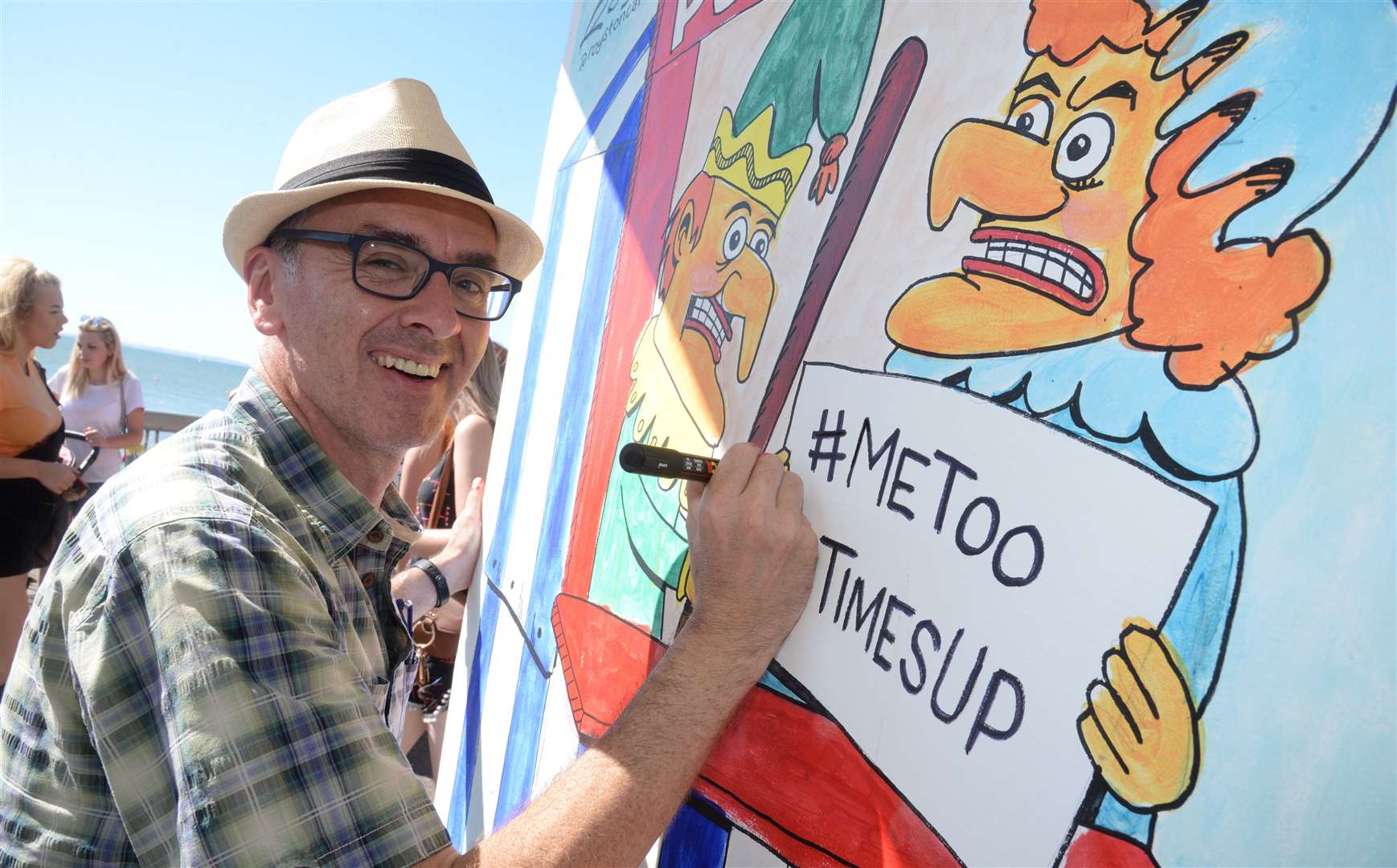 Royston Robertson with his depiction of Punch and Judy at the Cartoon Festival last year Picture: Chris Davey