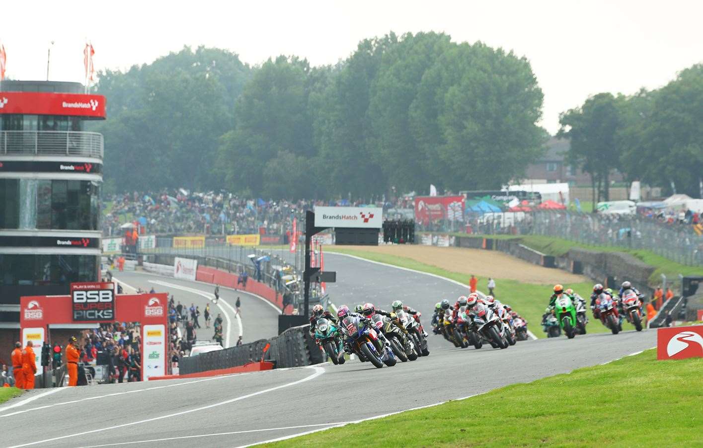 The Bennetts British Superbike Championship field approaches Paddock Hill Bend at Brands Hatch. Picture: BSB