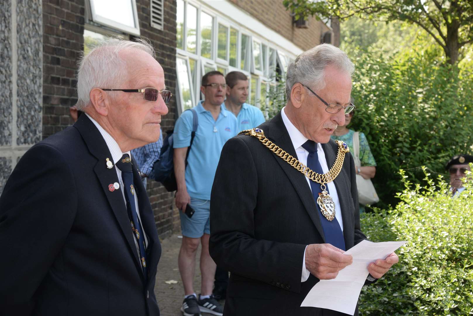 Gerry Ferrett with Lord Mayor Cllr Terry Westgate speaking after the Armed Forces Day flag was raised at Canterbury Fire Station on Saturday. Picture: Chris Davey. (13154131)