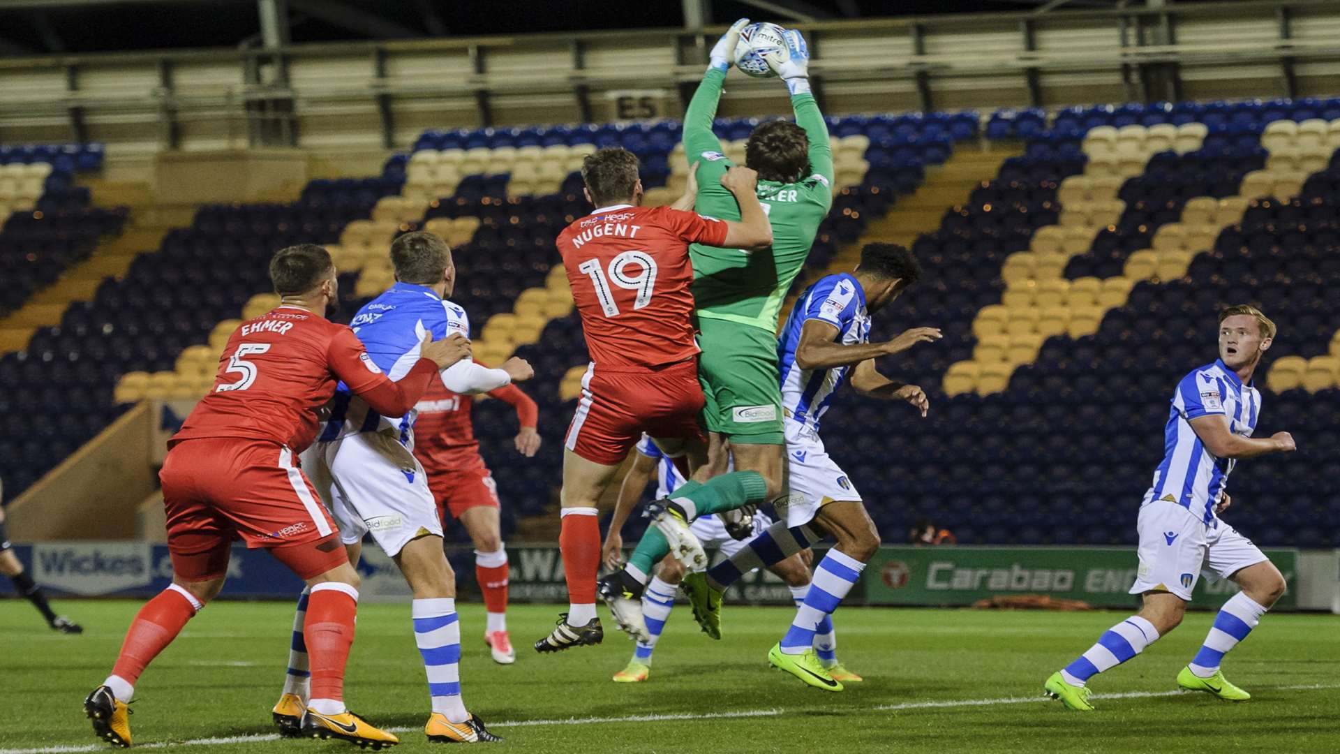 Gills force Colchester keeper Sam Walker into action Picture: Andy Payton
