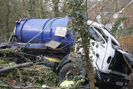 Waste lorry tips over on A21