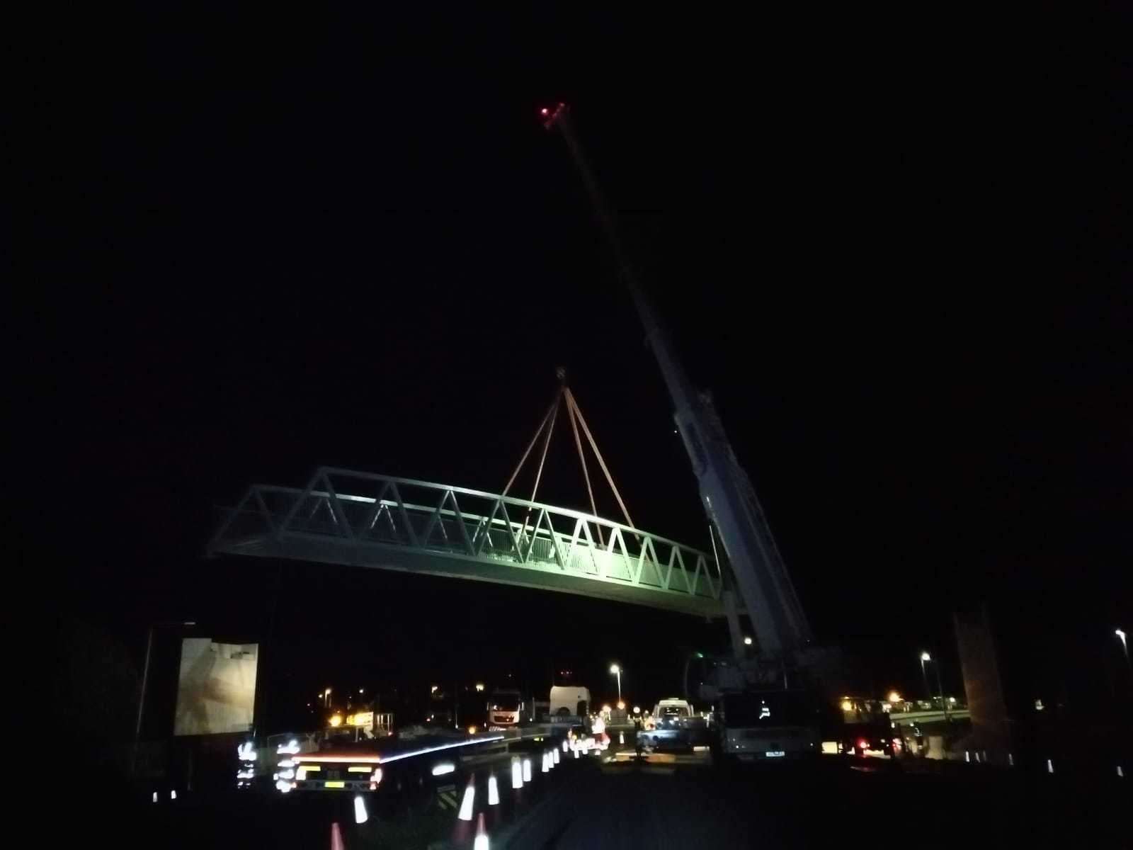 A mobile crane was used to install the footbridge. Picture: Highways England