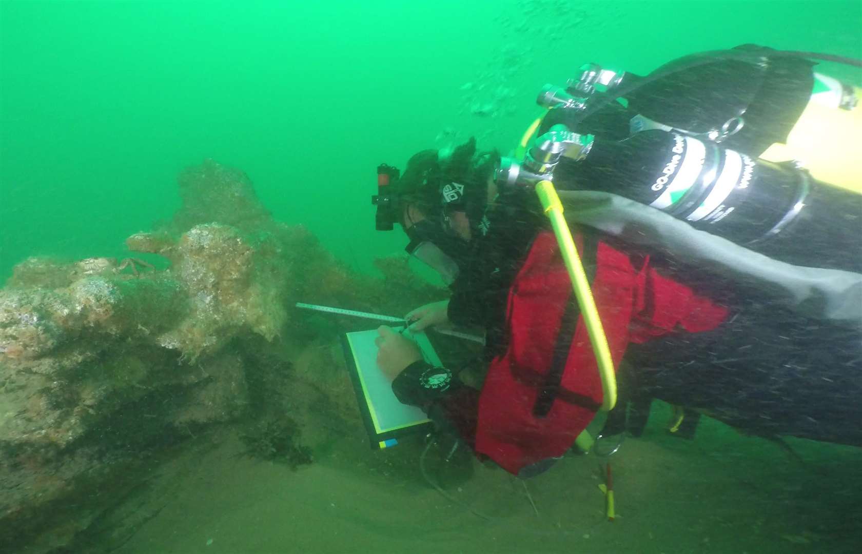 A diver makes drawings of the wreck of the Rooswijk off the Goodwin Sands in 2016