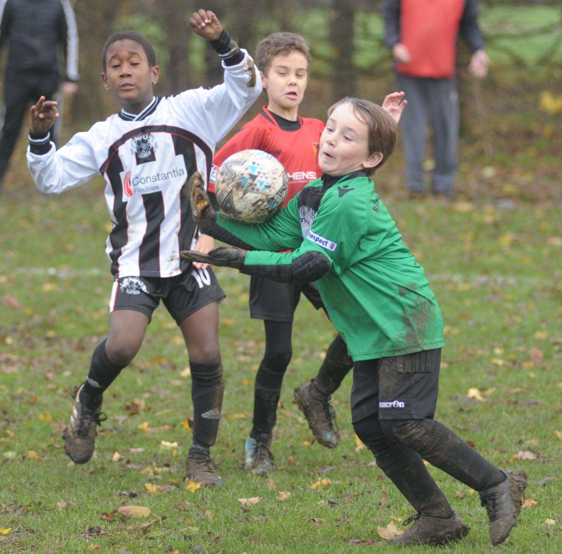 The Rainham 84 keeper is called into action against Milton & Fulston United under-8s Picture: Steve Crispe
