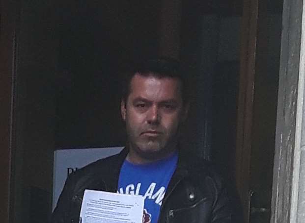 Orhan Idriz leaving court