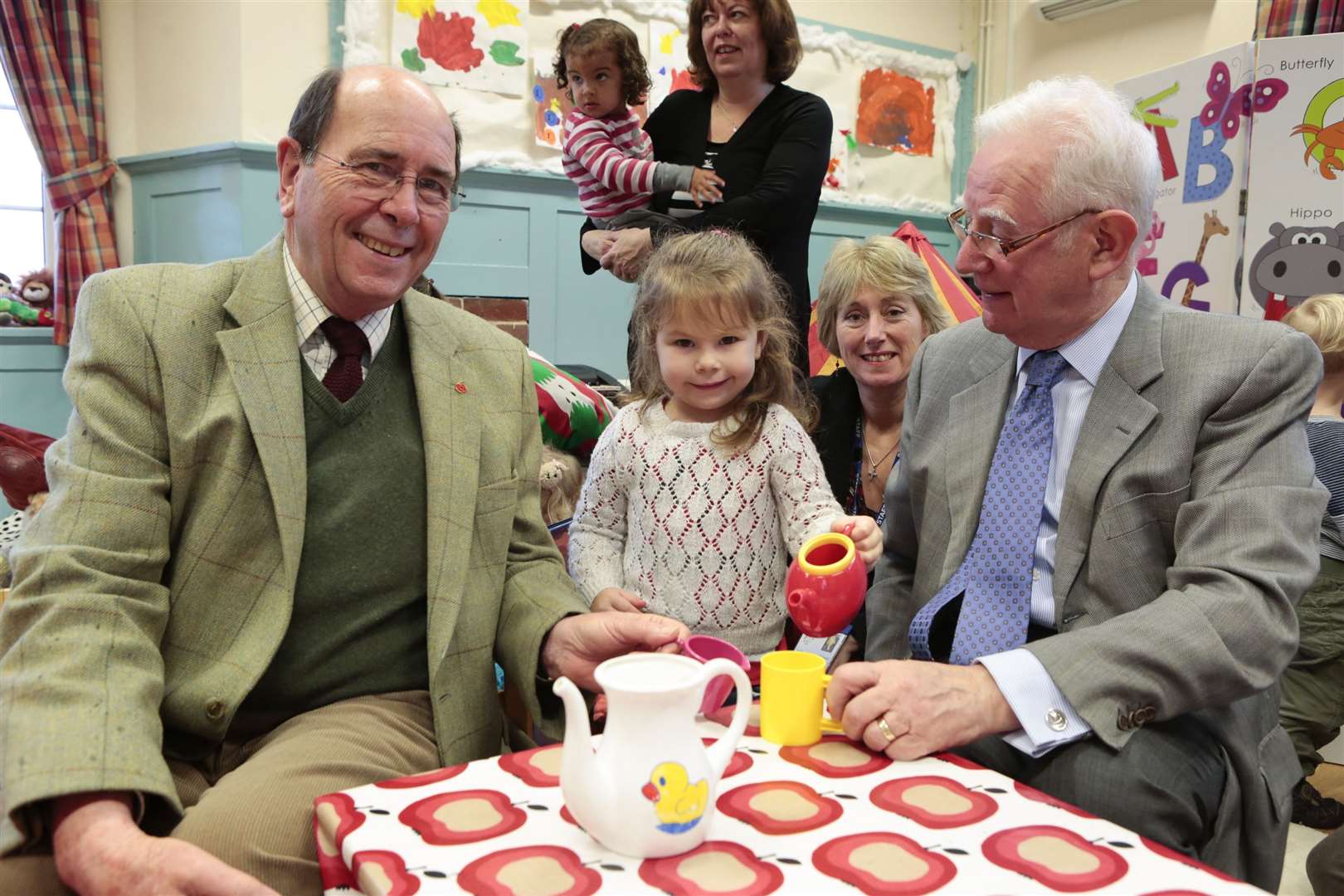 Anthony Farnfield joins Erin Williams and Antony Harris for tea at Goudhurst Village Pre-school
