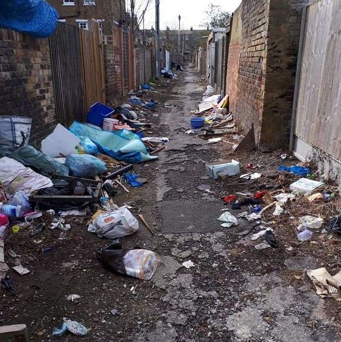 Fly tipping and waste strewn in alleyways between Elthelbert Road and Athelston Road in Margate (8433321)