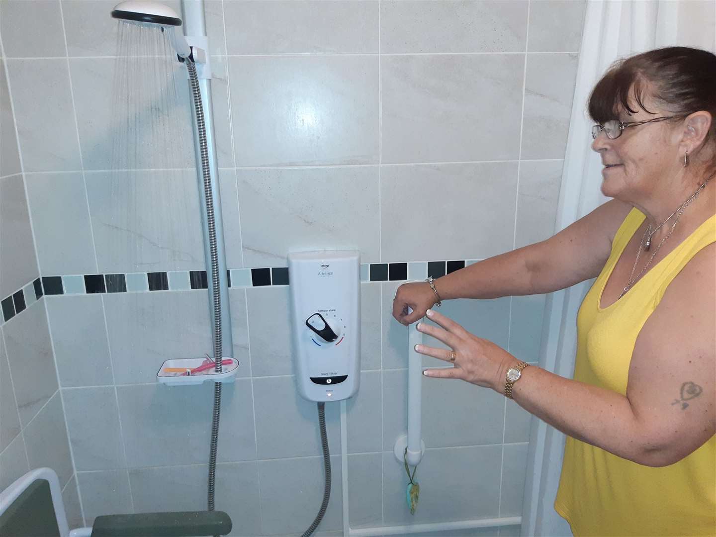 Annette Lewis-Rendle is having problems with her shower which will only run water for around 60 seconds