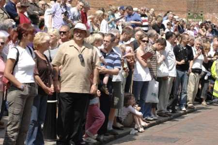 Crowds line the streets ready for the start of the festival