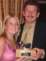 Charlotte Bailey receives the Coxswain of the Year Trophy from her father, Dover Rowing Club chairman Nick Bailey