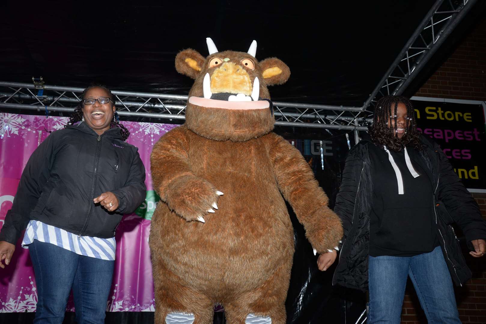 Contestants floss with The Gruffalo on stage at the Christmas lights switch-on. Picture: Chris Davey