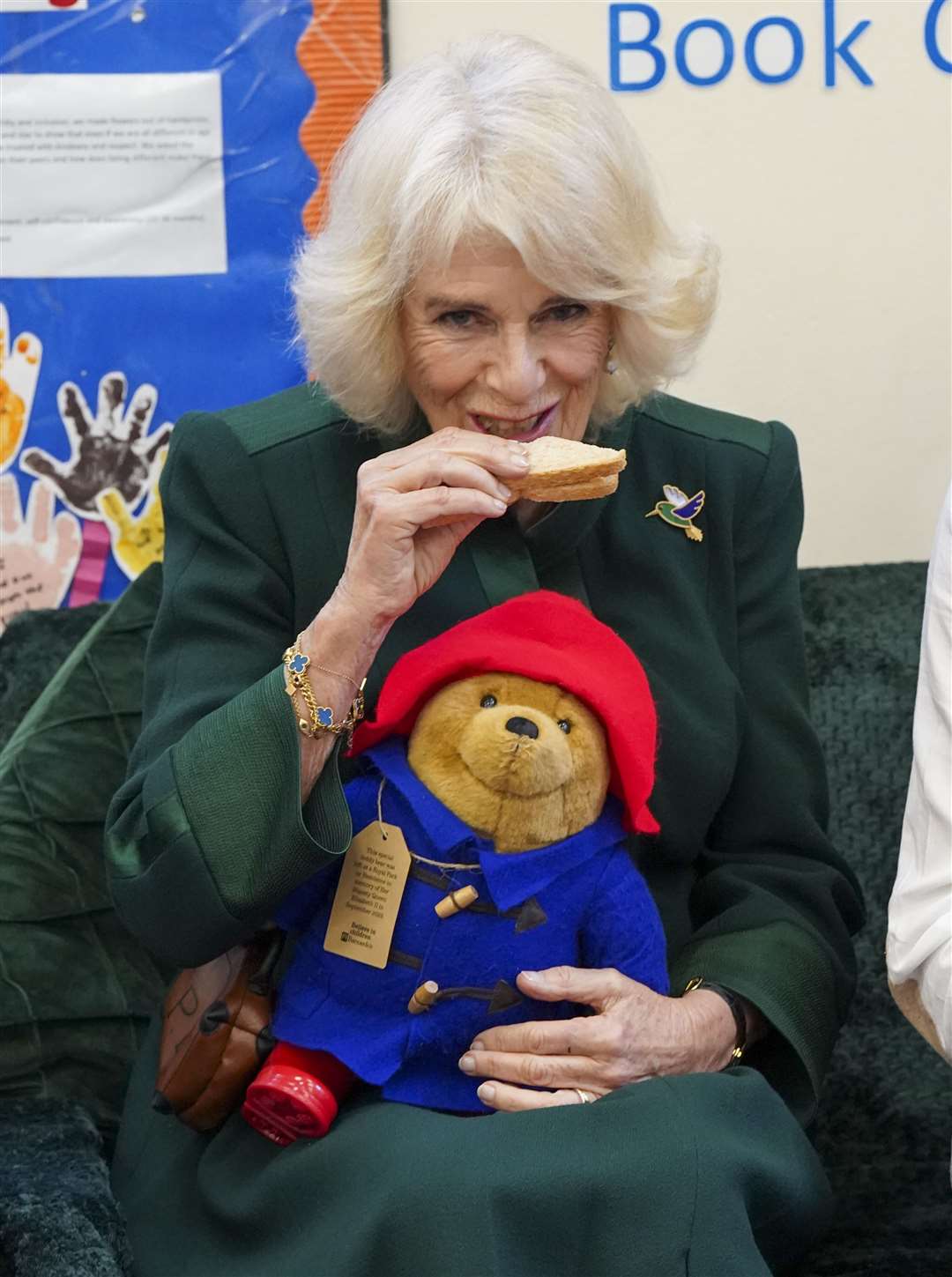 Camilla enjoys a marmalade sandwich with Paddington (Arthur Edwards/The Sun/PA)