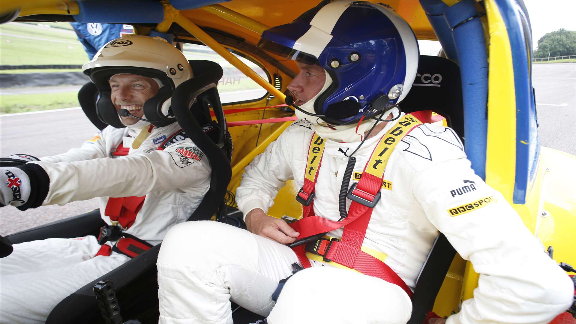 Button and Coulthard try the historic VW Beetle