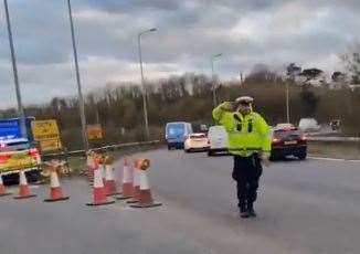 A dancing policeman entertaining drivers at Operation Brock. Picture: @SteveTunniclif2