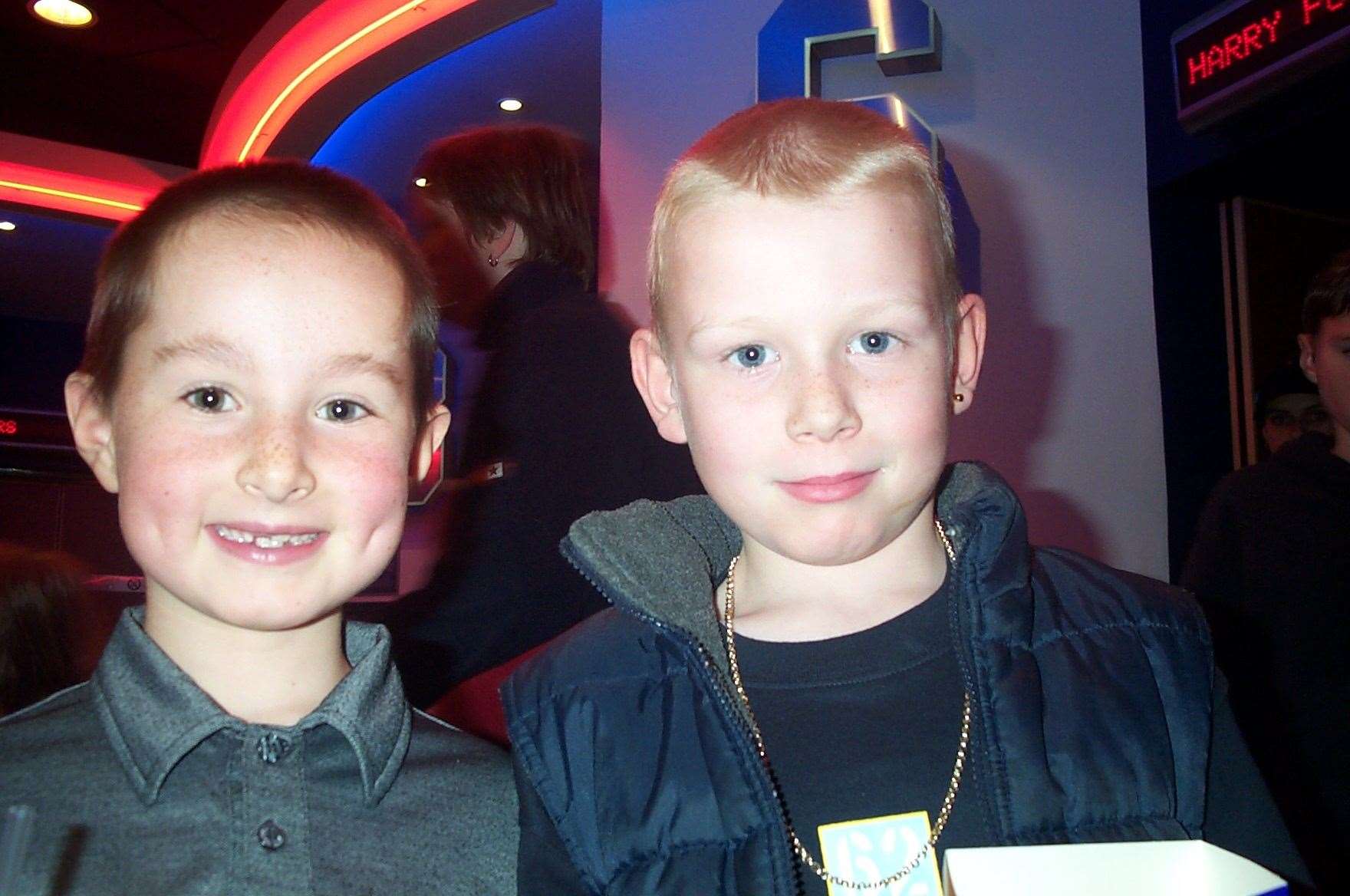 Ellis Anderson, 7, and Thomas Towner, 8, get ready to watch Harry Potter at the Odeon Cinema at Lockmeadow in November 2001