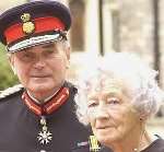 PROUD MOMENT: Barbara Butcher, with the Lord Lieutenant of Kent Allan Willett, on the day she was awarded the MBE . Picture: PAUL DENNIS