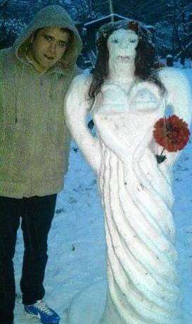 John Glendinning with his Bridezilla snow sculpture, based on his fiance