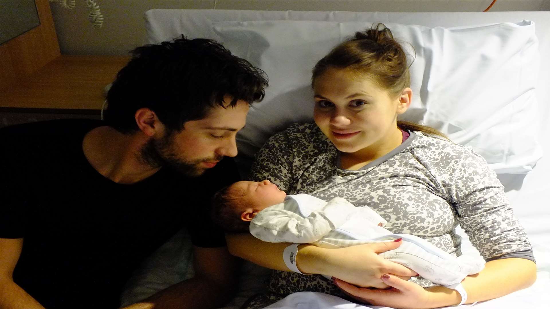Baby Alfred George born at 1.30am on New Year's Day weighing 7lb 14oz. Pictured with mum Stacey Jeves and partner George Atkin from Sidcup